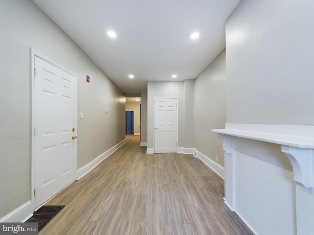 corridor featuring light wood-type flooring