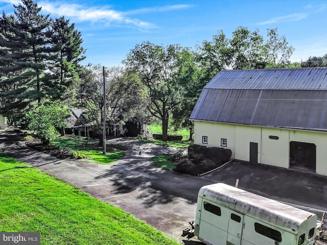 1414 Little Ln, Seven Valleys, PA 17360 - view of property exterior featuring metal roof and stucco siding