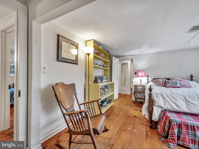 1414 Little Ln, Seven Valleys, PA 17360 - bedroom with visible vents, baseboards, and hardwood / wood-style floors