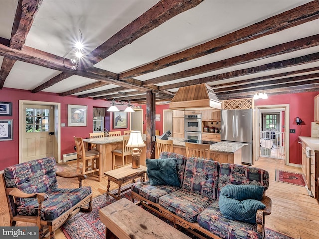 1414 Little Ln, Seven Valleys, PA 17360 - living area featuring beamed ceiling, a baseboard radiator, light wood-type flooring, and baseboards