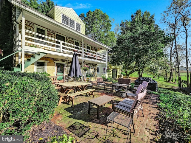1414 Little Ln, Seven Valleys, PA 17360 - back of property featuring an outdoor living space, a patio, and a balcony