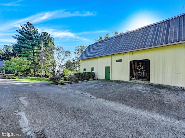 1414 Little Ln, Seven Valleys, PA 17360 - view of building exterior with a garage and a pole building
