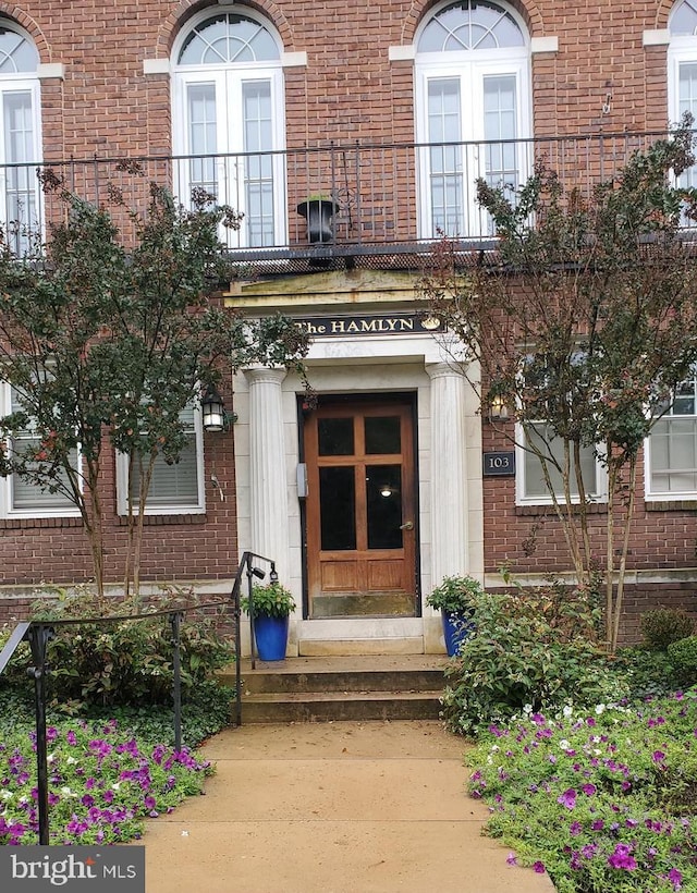 property entrance featuring french doors