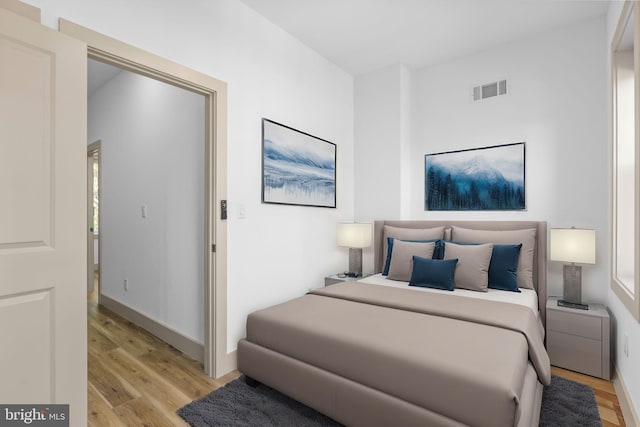 bedroom with light wood-type flooring