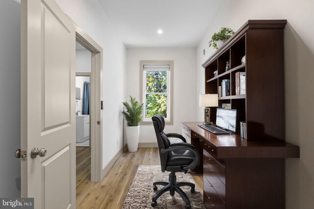 office area with light wood-type flooring