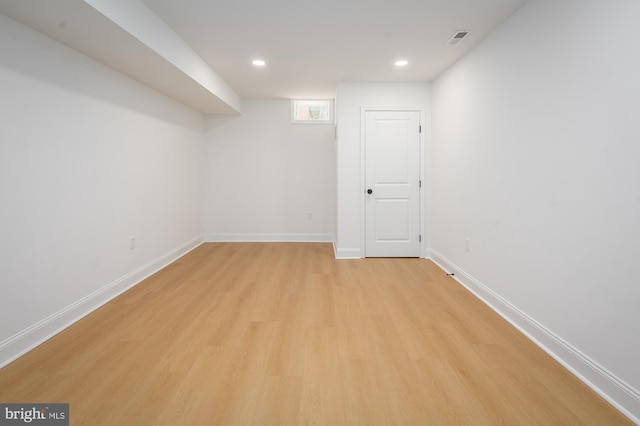 basement with light wood-type flooring