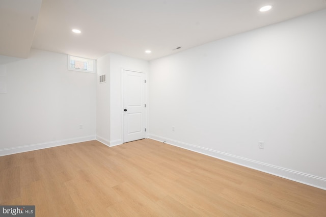 basement featuring light wood-type flooring