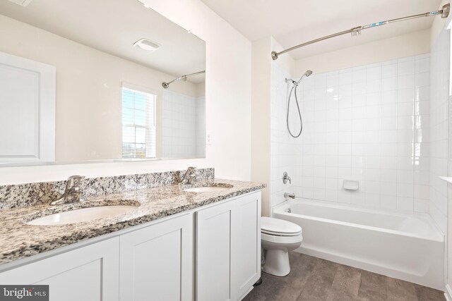 18 Smokehouse Rd, Carlisle, PA 17013 - bathroom with toilet, double vanity, and shower / washtub combination