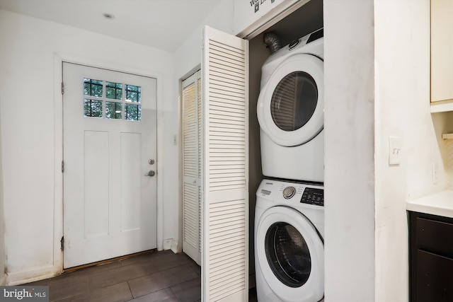 laundry room featuring stacked washer and dryer