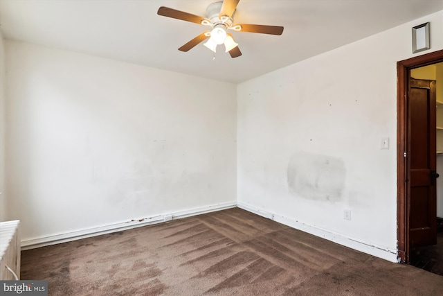 carpeted empty room featuring ceiling fan