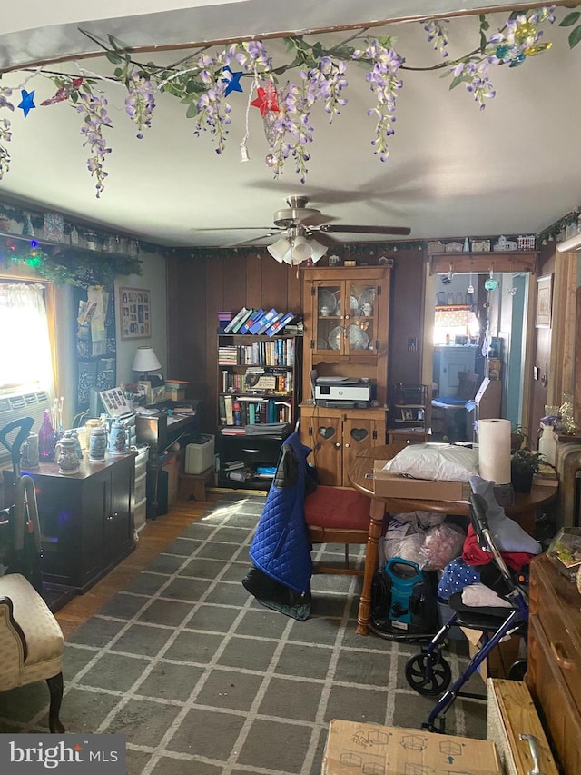 interior space featuring ceiling fan