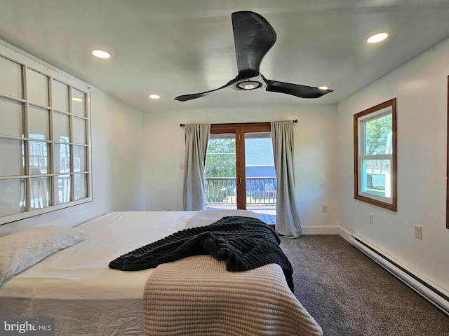 carpeted bedroom featuring a baseboard heating unit, access to outside, and ceiling fan