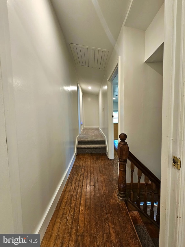 20826 Bivalve Wharf Rd, Bivalve, MD 21814 - corridor featuring visible vents, baseboards, an upstairs landing, dark wood-style floors, and attic access