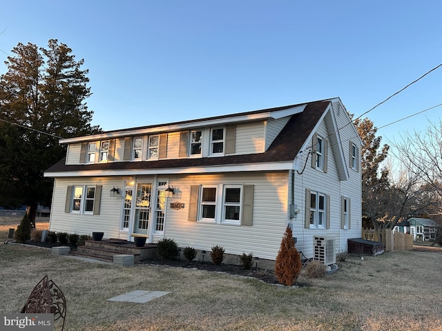 20826 Bivalve Wharf Rd, Bivalve, MD 21814 - bungalow with central AC unit, a front lawn, and a shingled roof