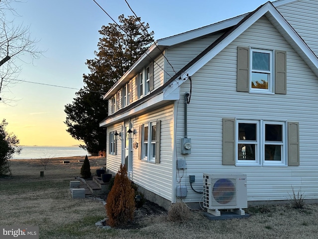 20826 Bivalve Wharf Rd, Bivalve, MD 21814 - back of house at dusk with a water view and ac unit