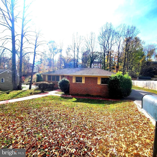 view of home's exterior featuring a lawn