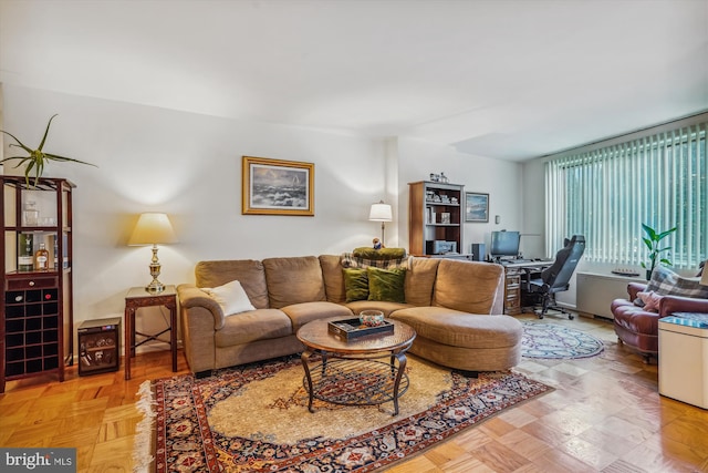 living room with light parquet floors