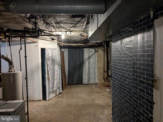 basement featuring water heater