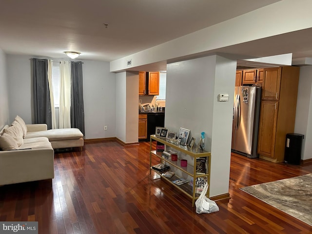 living room featuring dark hardwood / wood-style floors