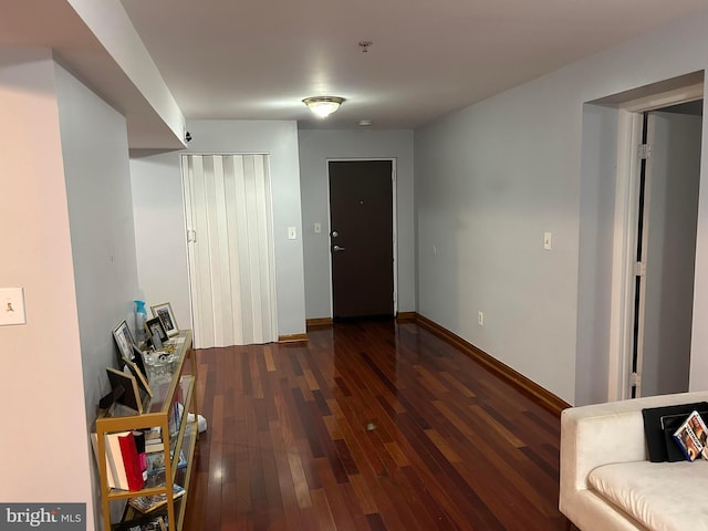 interior space with dark hardwood / wood-style flooring