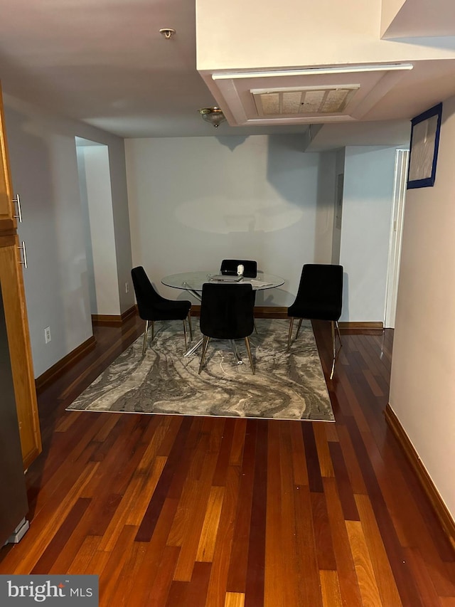 sitting room with dark hardwood / wood-style floors