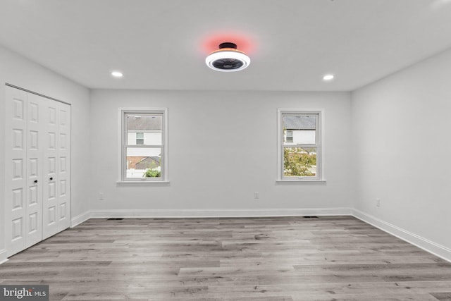 interior space featuring plenty of natural light and light hardwood / wood-style floors