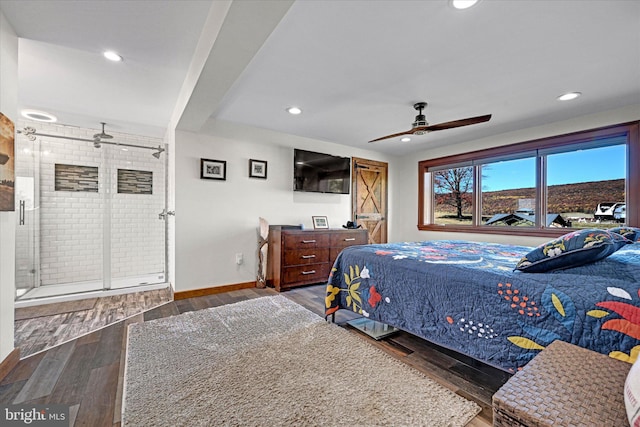 bedroom featuring dark hardwood / wood-style floors and ceiling fan