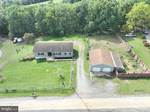 birds eye view of property with a rural view