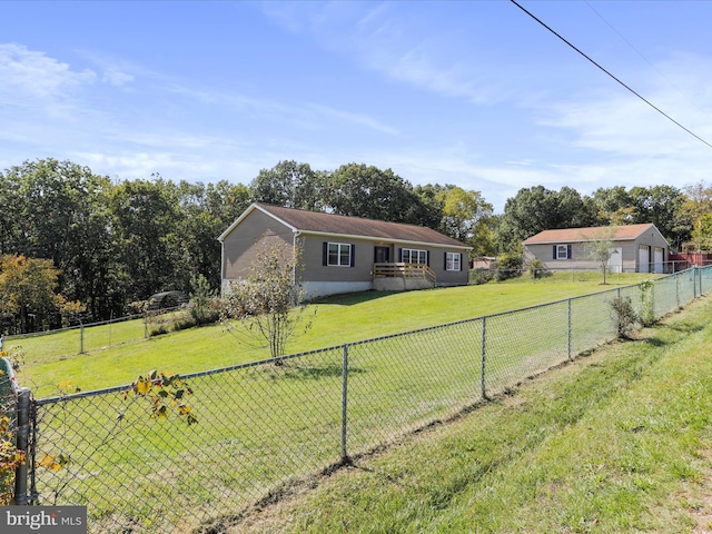 ranch-style house featuring a front lawn