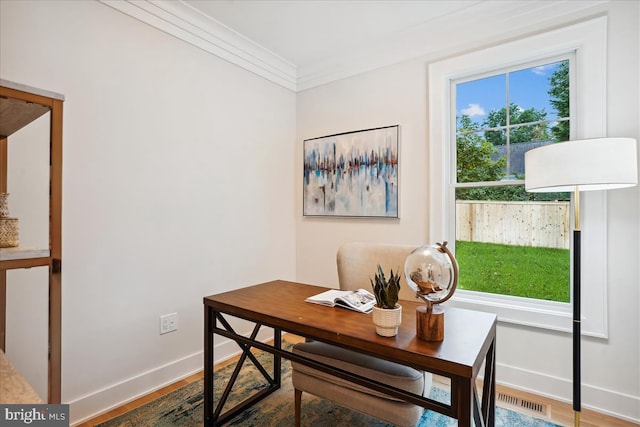 office area with crown molding and hardwood / wood-style floors