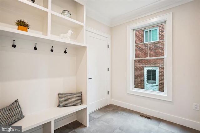 mudroom with crown molding