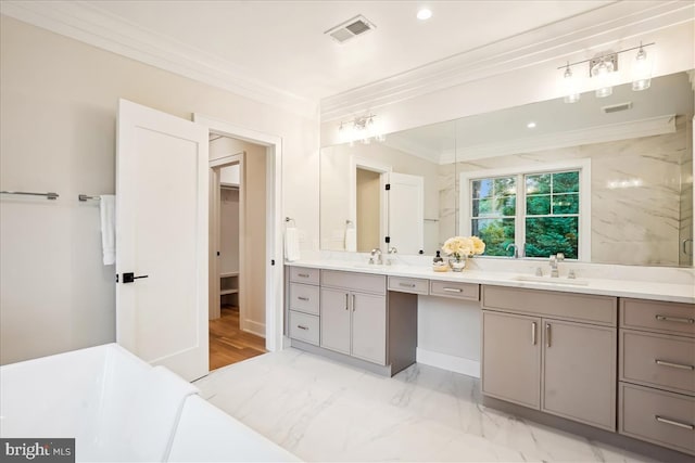 bathroom with walk in shower, crown molding, vanity, and hardwood / wood-style flooring