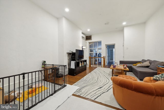 living room with hardwood / wood-style floors