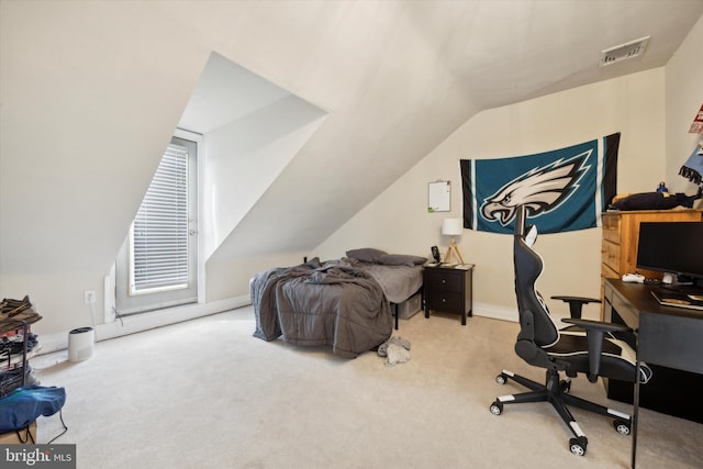 carpeted office space with lofted ceiling