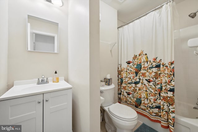 full bathroom featuring shower / bath combination with curtain, vanity, and toilet