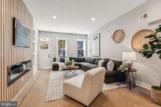 living room with light parquet floors