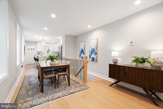 dining room with light hardwood / wood-style floors