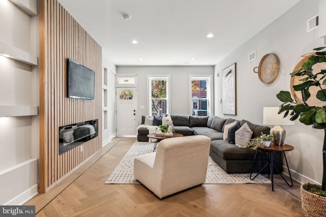 living room with light parquet flooring