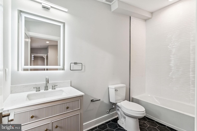 full bathroom with vanity, toilet, tile patterned floors, and shower / bathtub combination