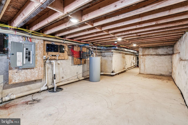 basement with gas water heater and electric panel