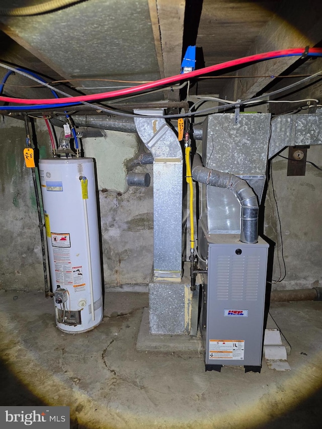 utility room with gas water heater and heating unit