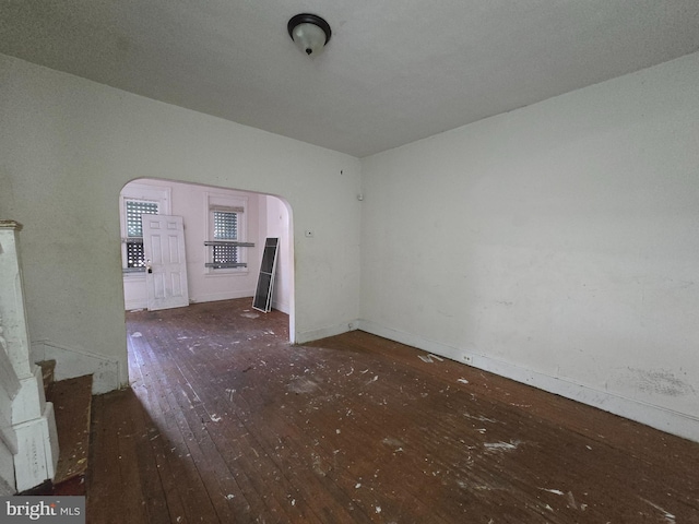 interior space with dark hardwood / wood-style floors