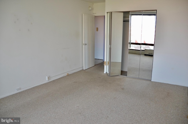 unfurnished bedroom featuring a closet