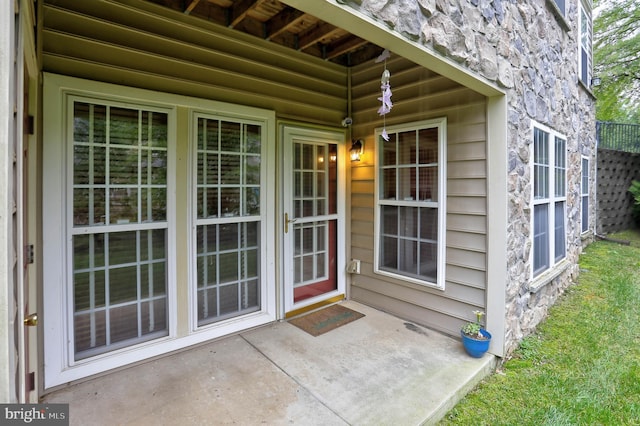 doorway to property featuring a patio