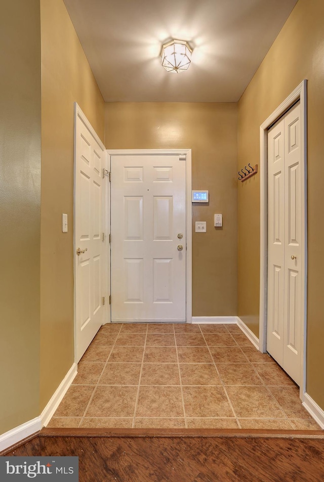 doorway featuring hardwood / wood-style floors