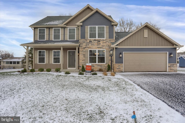 594 Augusta Dr, Selinsgrove, PA 17870 - craftsman-style home featuring a garage, gravel driveway, stone siding, and board and batten siding