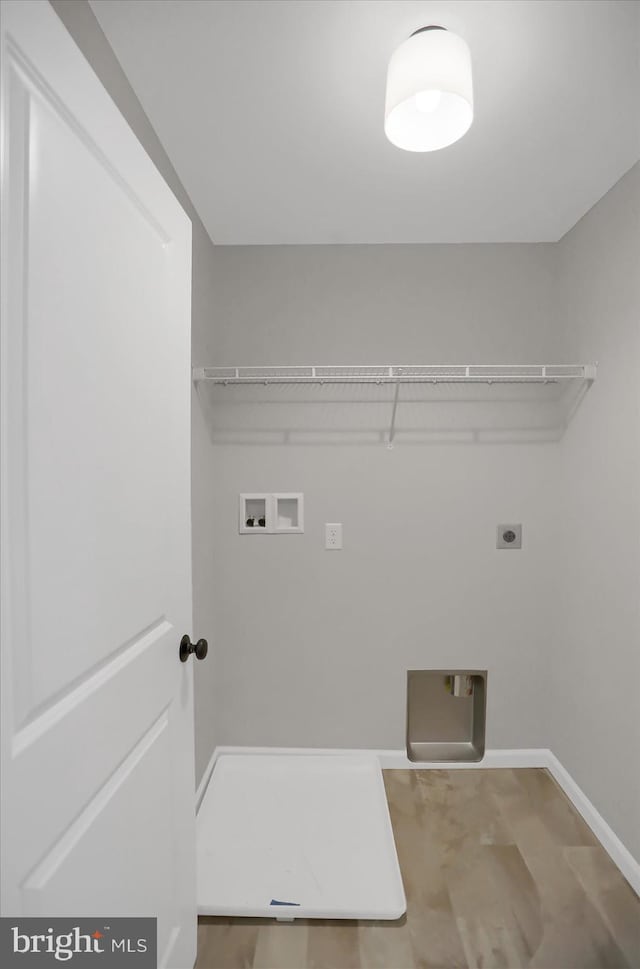 laundry area featuring hookup for a washing machine and hookup for an electric dryer