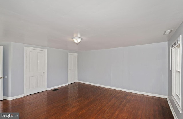 empty room featuring hardwood / wood-style floors