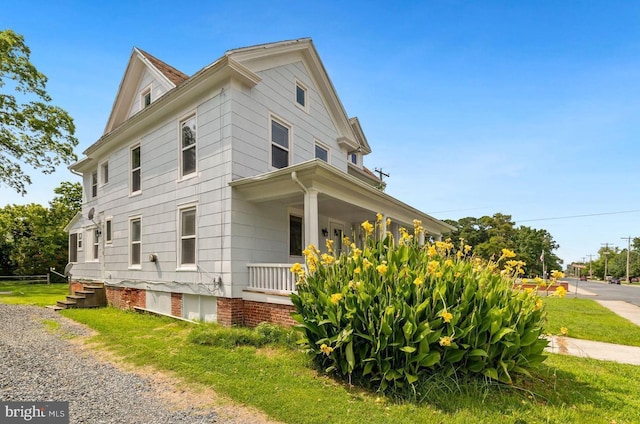 view of home's exterior with a porch