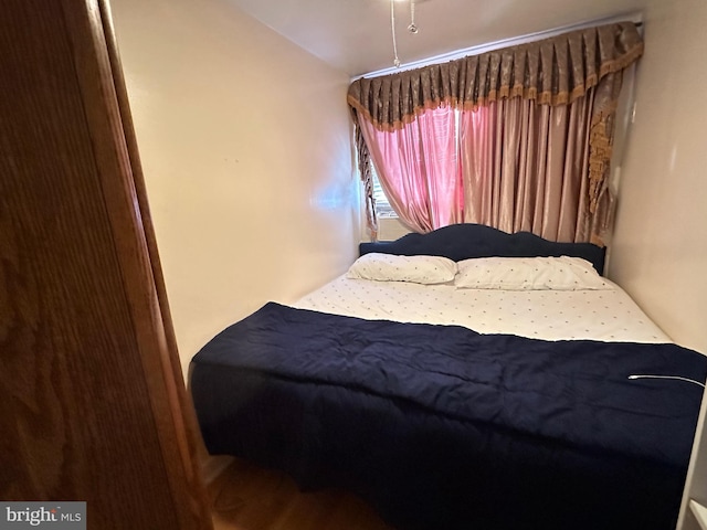 bedroom featuring lofted ceiling